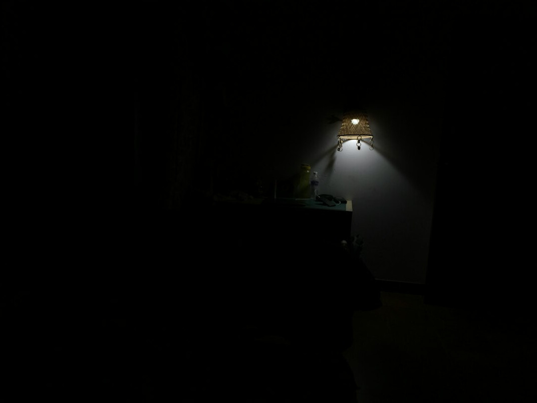 tense conversation in dark room